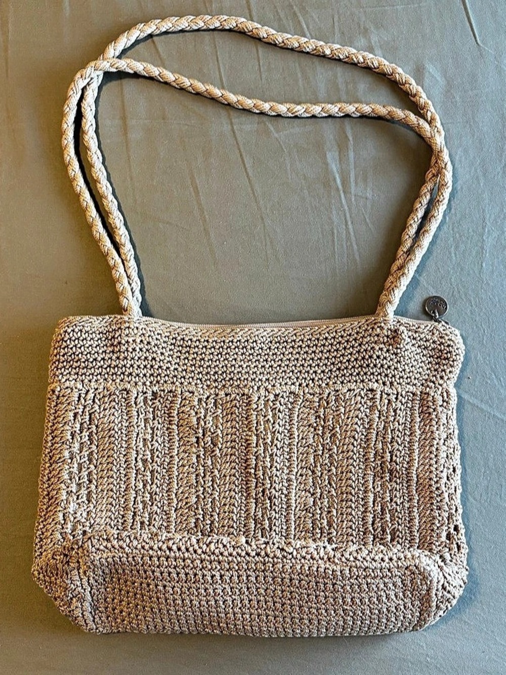 the sak Woven Crochet Shoulder Bag in Brown with gold metallic base